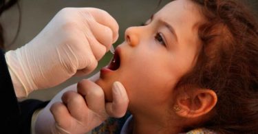 Small Girl Getting Polio Vaccine