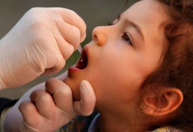 Small Girl Getting Polio Vaccine