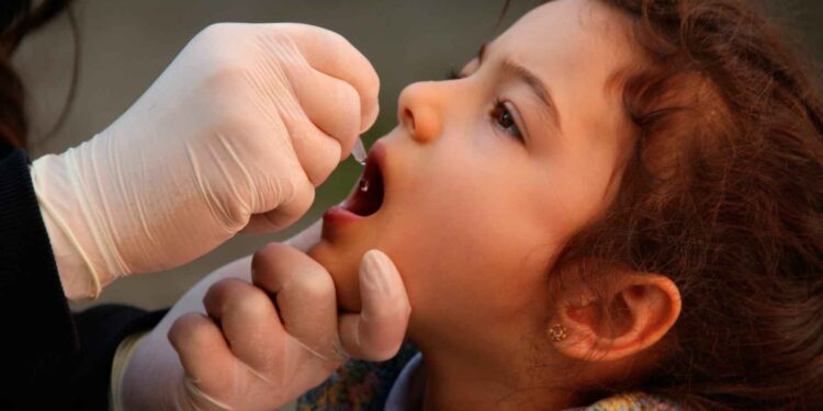 Small Girl Getting Polio Vaccine