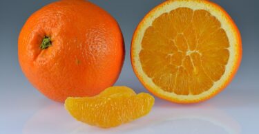 1200px Oranges whole halved segment