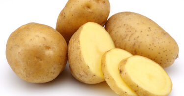 raw potatoes with slices picture id496359598